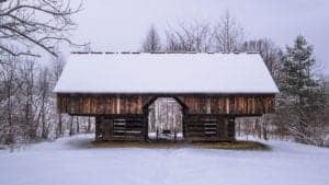Cades Cove cantilever barn covered in snow