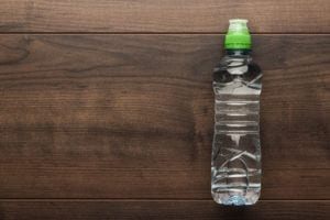 water bottle on a wooden surface