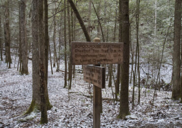 schoolhouse gap trail sign in the winter